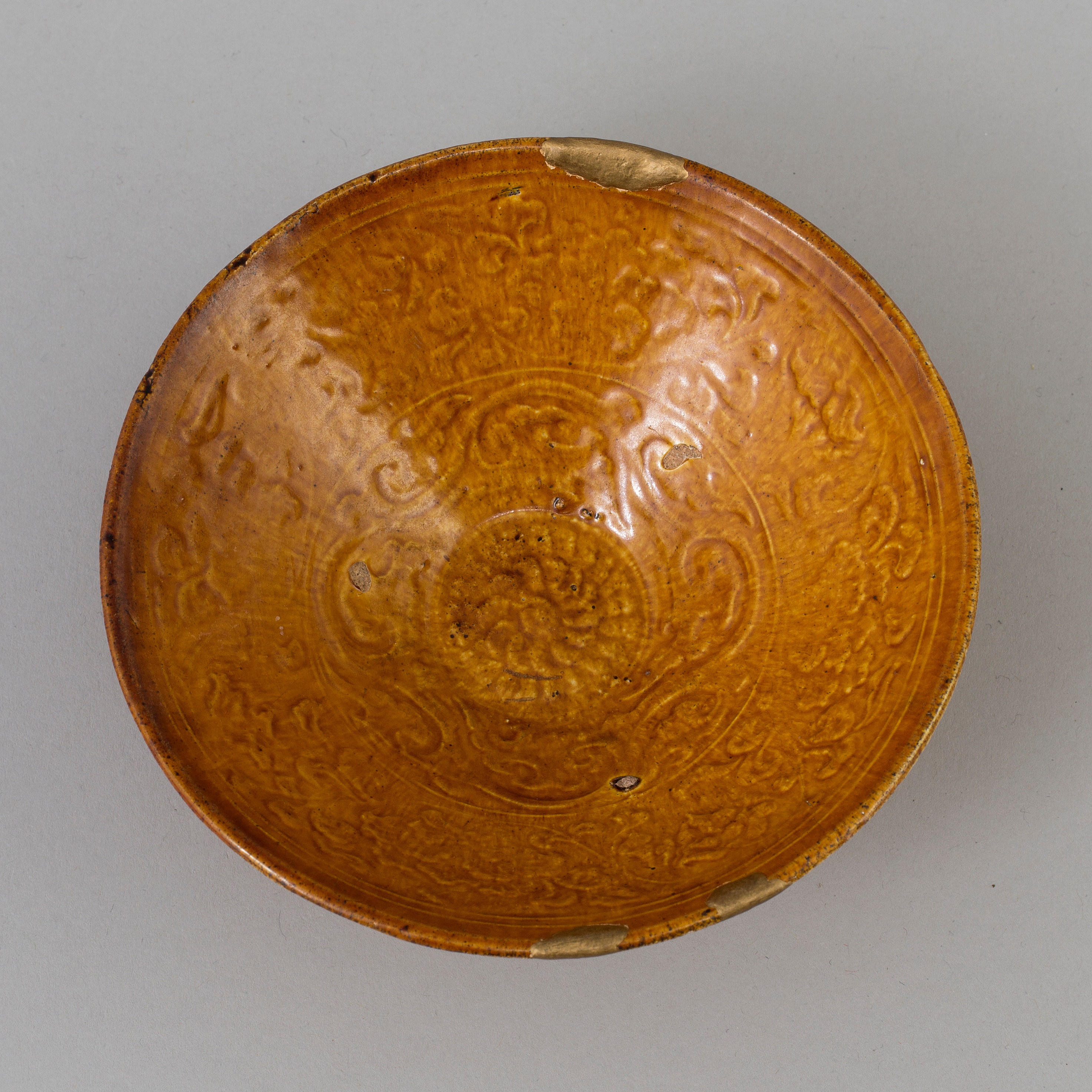 A Chinese yellowglazed ceramic bowl, Liao dynasty (9161225). Bukowskis