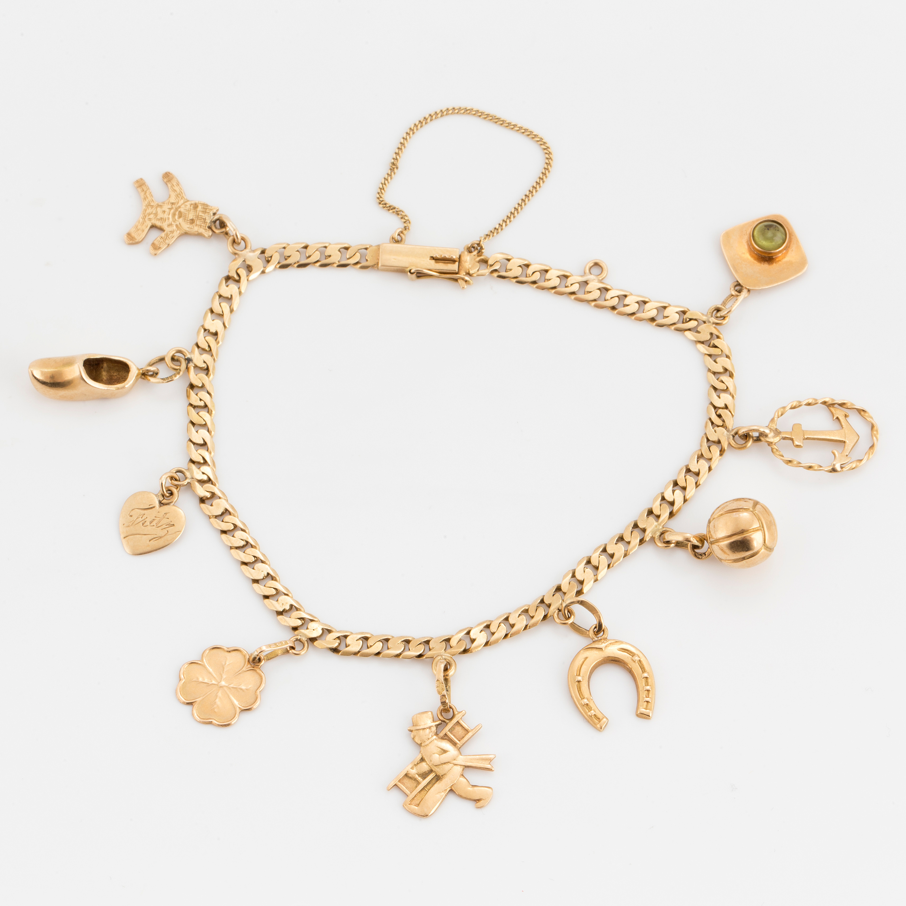 ARMBAND, med berlocker. - Bukowskis
