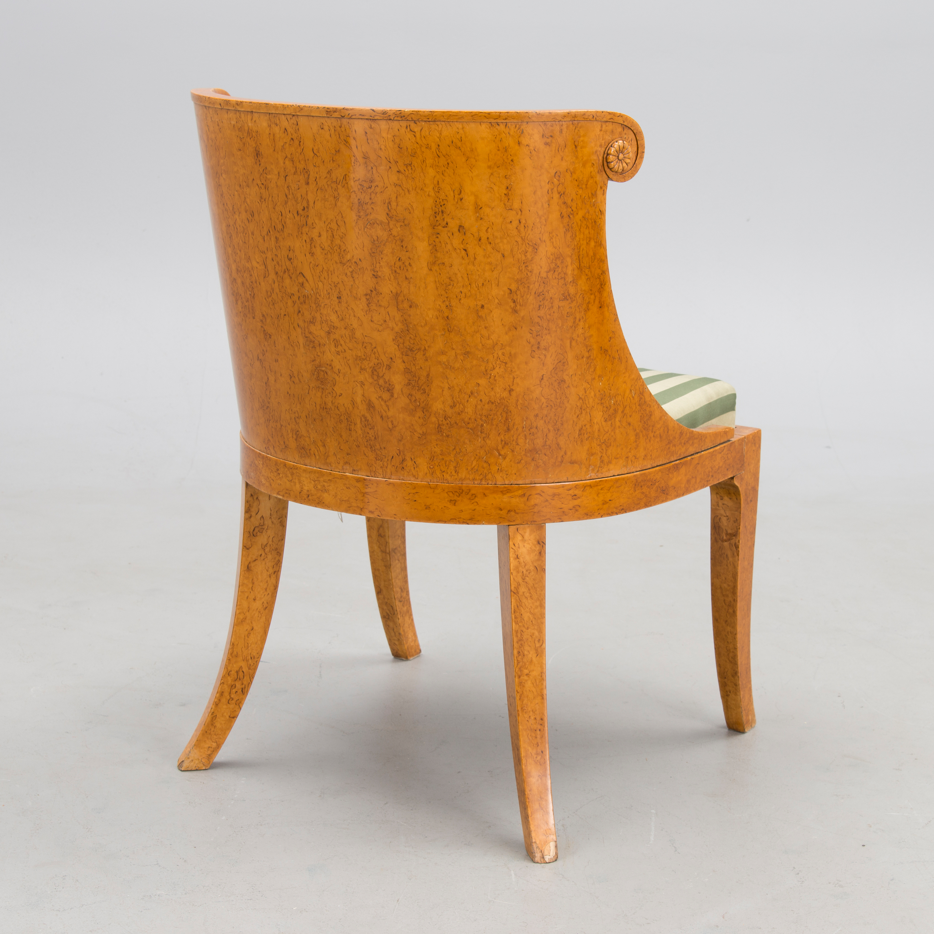 A RUSSIAN ARMCHAIR, Carelian birch, late 20th century. Bukowskis