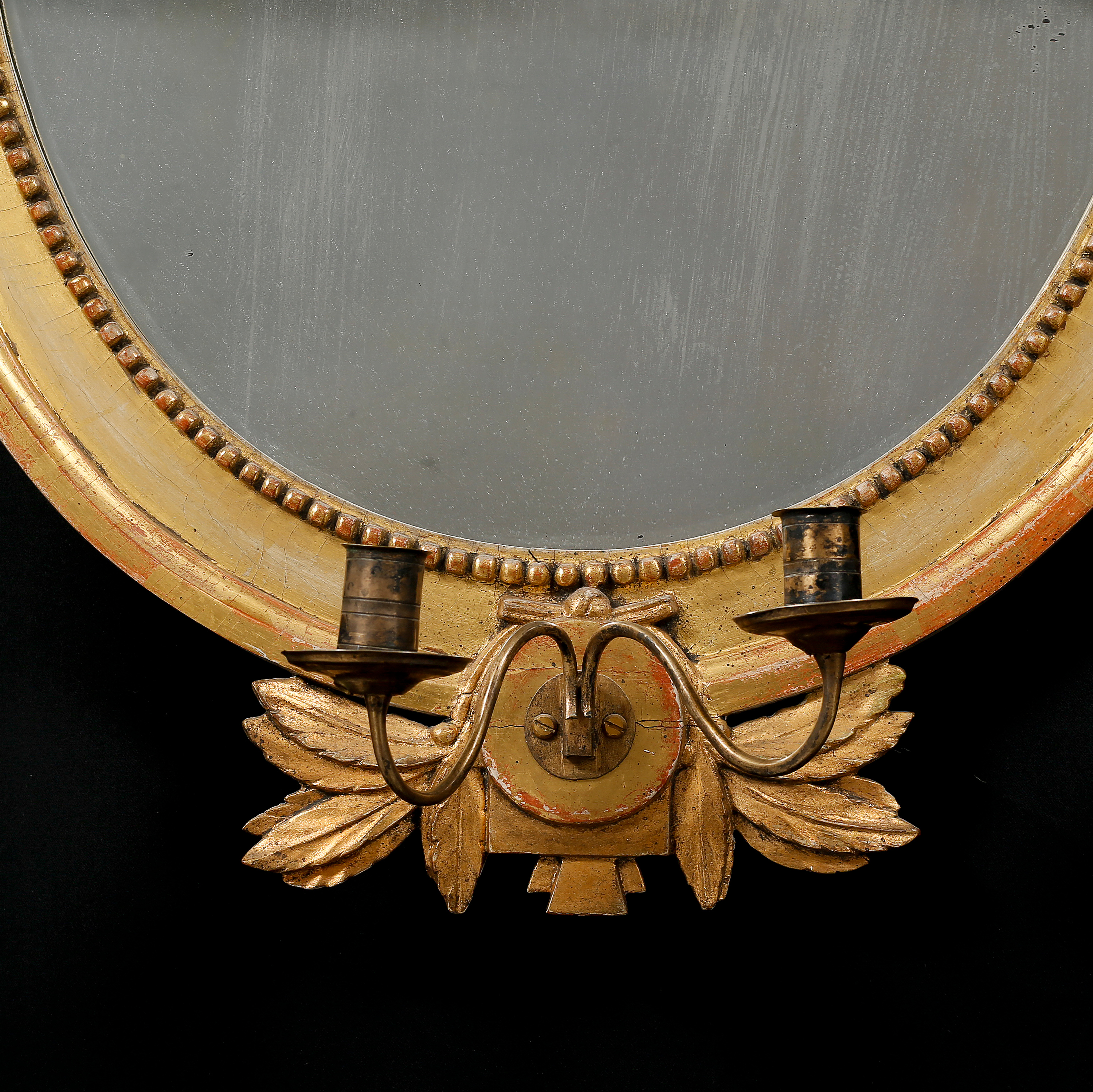 A Gustavian mirror from the 18th century. Bukowskis