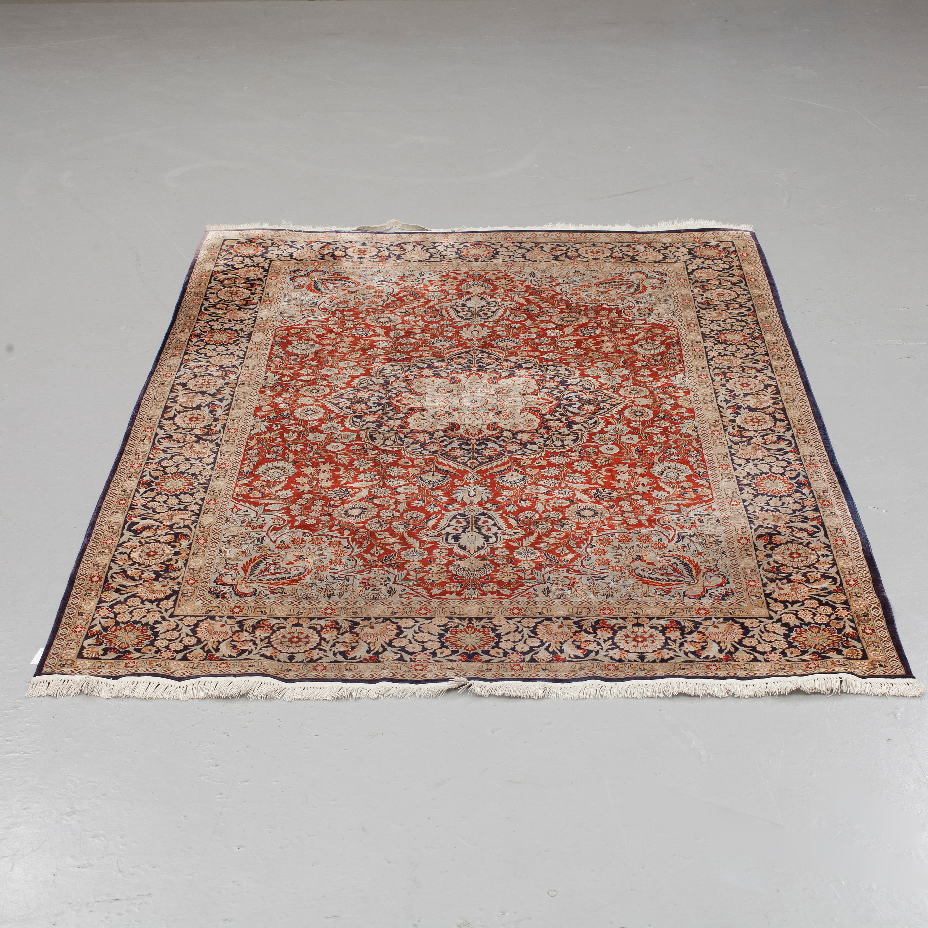 An oriental silk rug, around 200 x 139 cm. Bukowskis