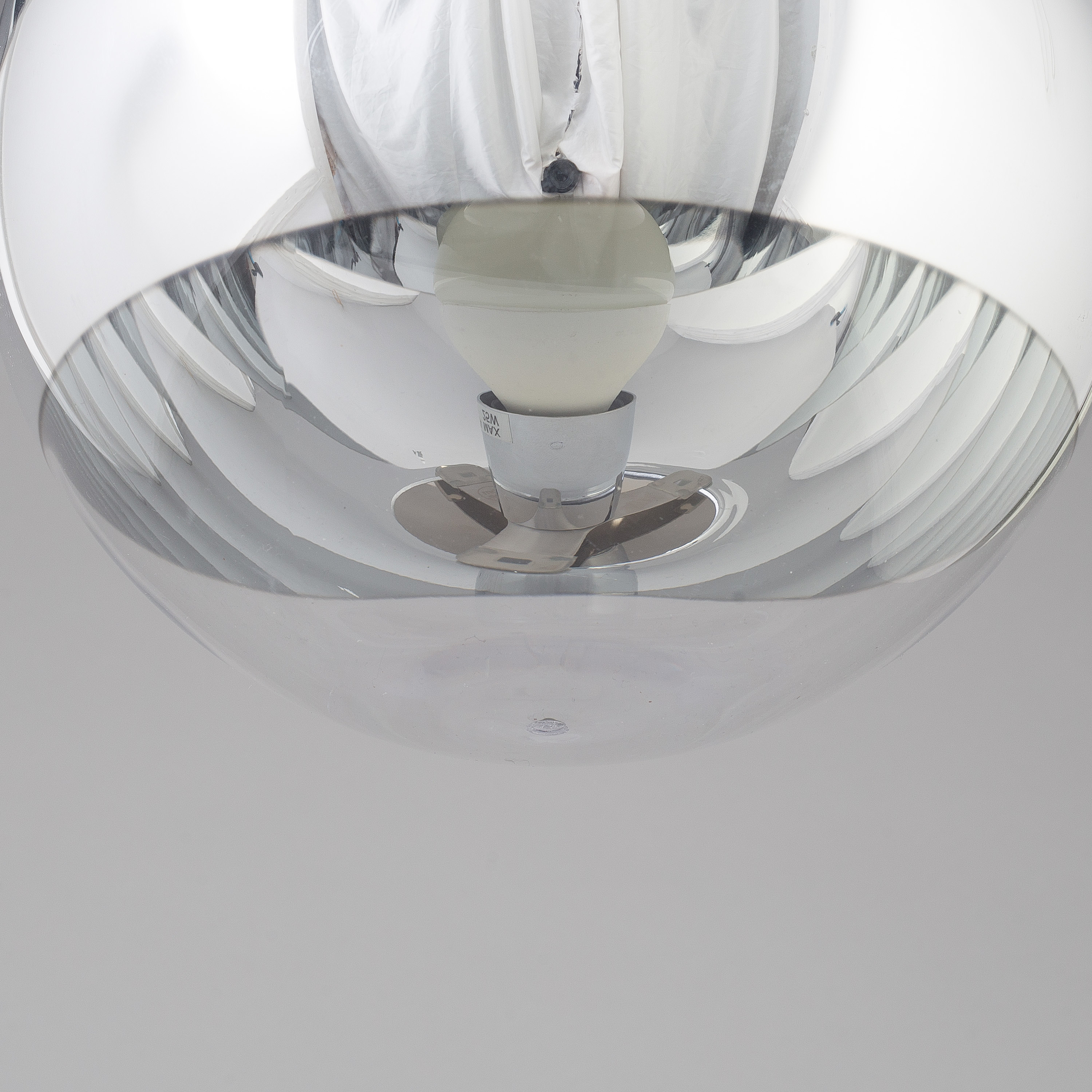 A mirror ball pendant light by Tom Dixon. Bukowskis