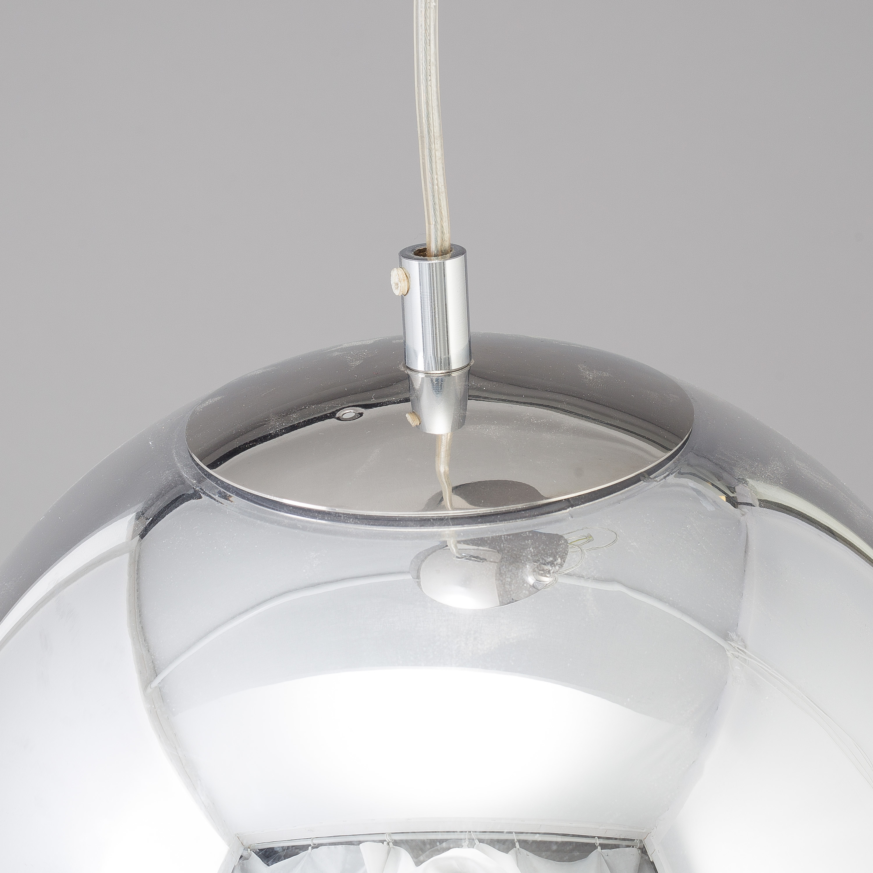 A mirror ball pendant light by Tom Dixon. Bukowskis
