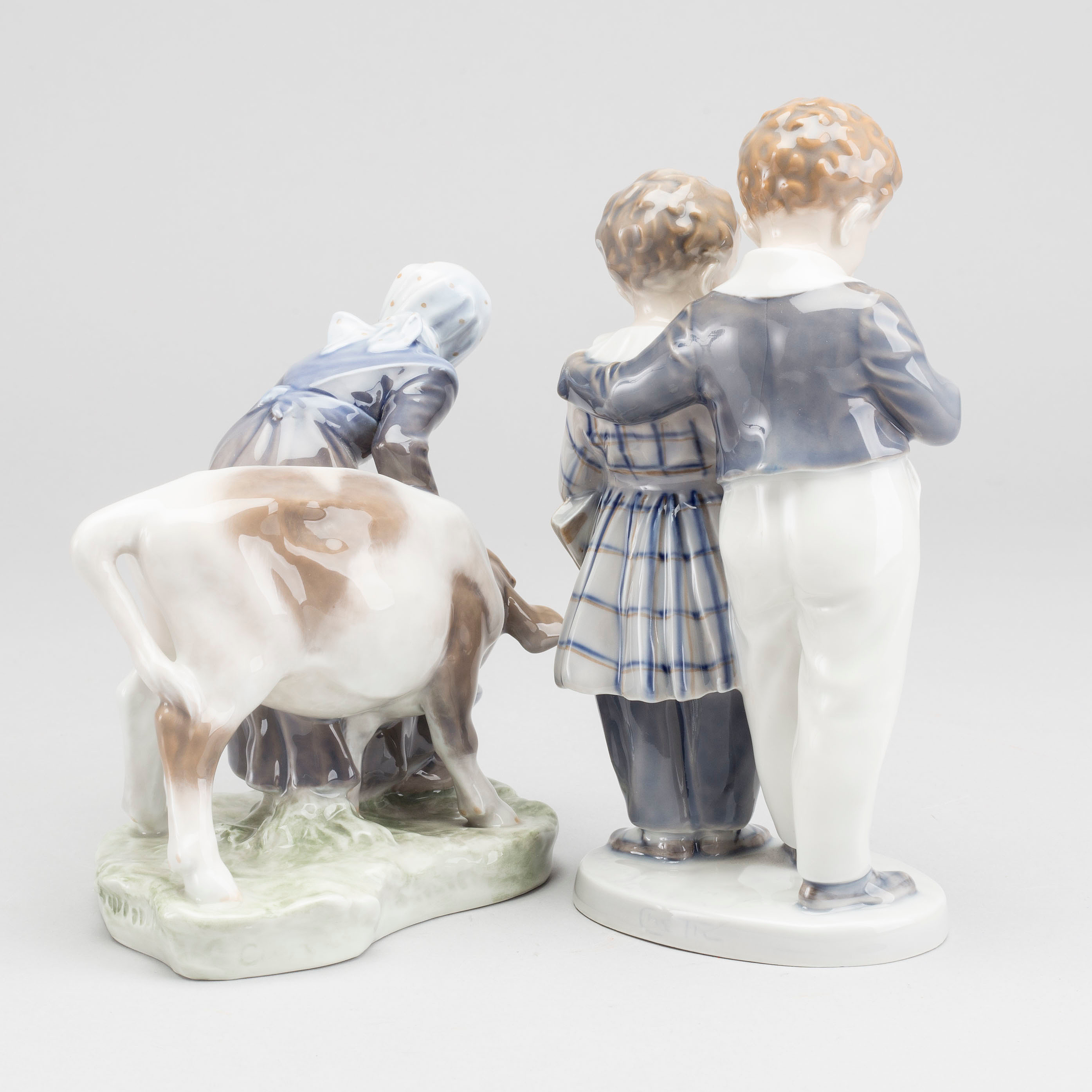 Two porcelain Danish Royal Copenhagen figurines, one signed CHRISTIAN