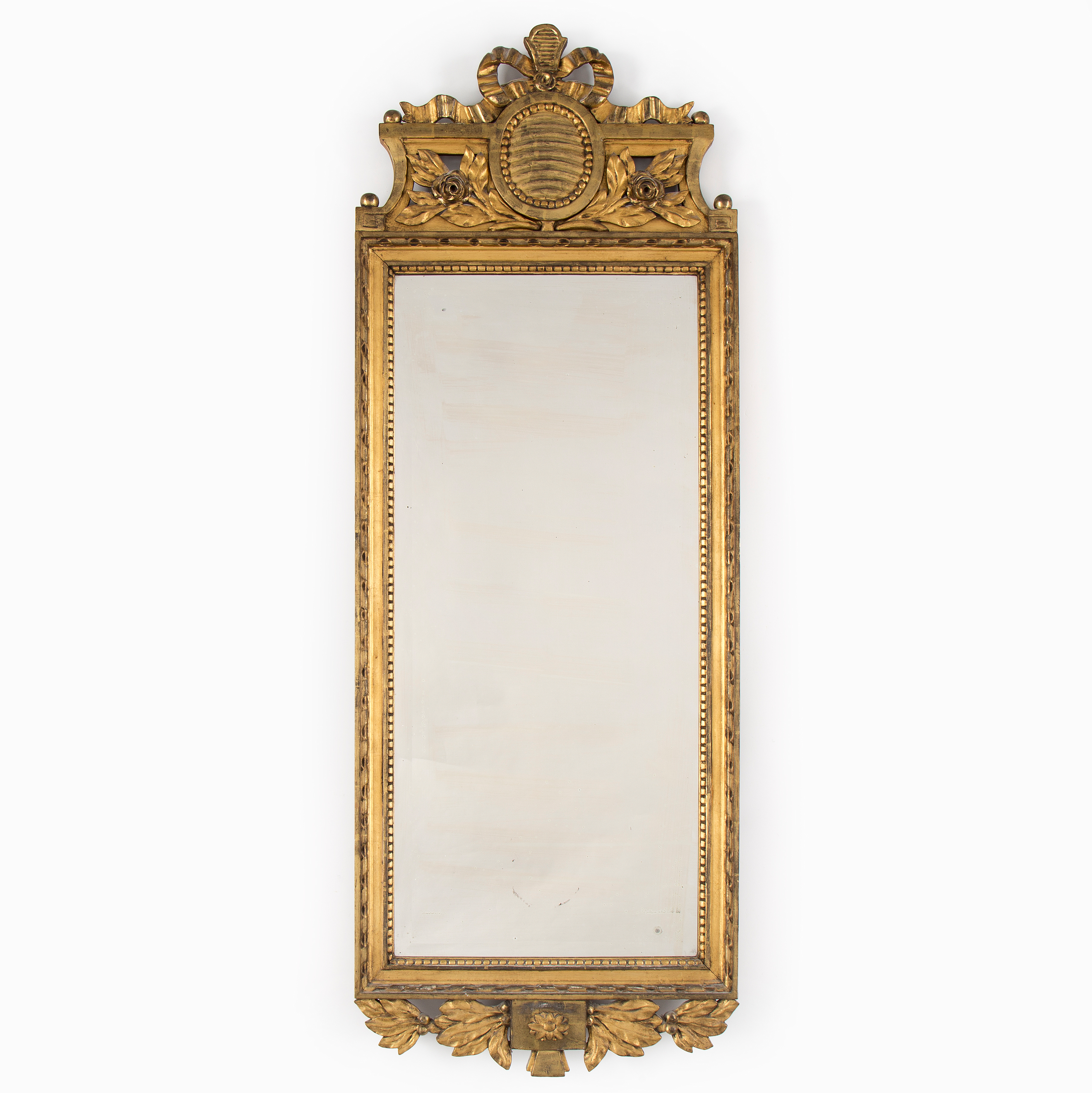 An early 20th century late Gustavian style mirror. Bukowskis