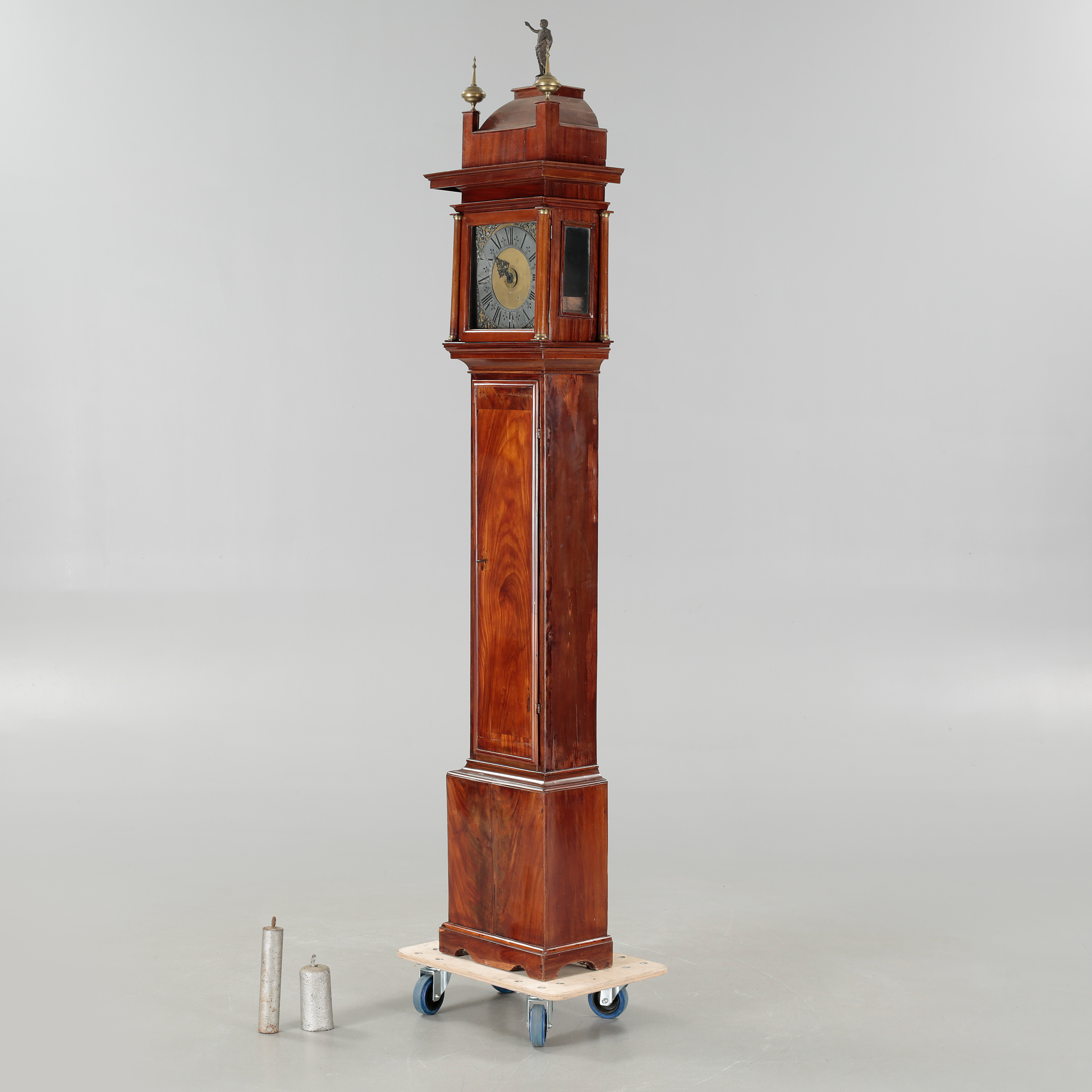 A grandfather clock, dial marked "H, APolhammar, StSund", 1755
