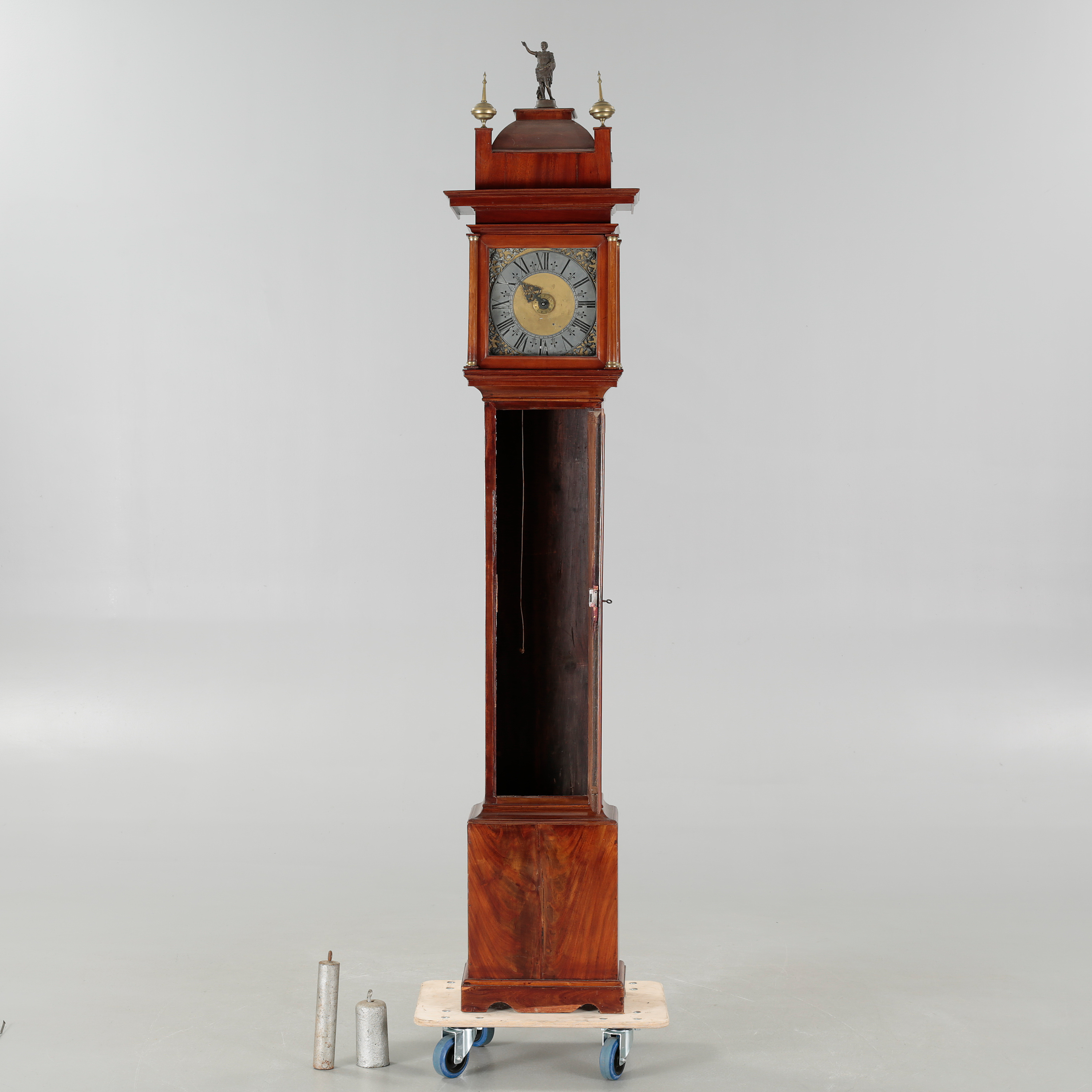 A grandfather clock, dial marked "H, APolhammar, StSund", 1755